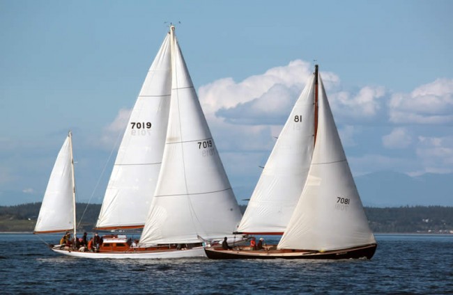 PACIFICA and SPARLE heading upwind DURING RACE 4 OF THE PTSA Spring WhiteCap Series. No whitecaps Friday night but plent the next day. Phot by Pete Leenhouse, Director of the Northwest Wooden Boat School from Dan and Linda's Fly'in Pony.